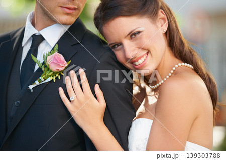Bride woman, hug groom and portrait with smile, diamond ring and excited with love, care and fresh start. Couple, wedding and commitment to marriage in summer, outdoor and together for celebration Bride woman, hug groom and portrait with smile, diamond ring and excited with love, care and fresh start. Couple, wedding and commitment to marriage in summer, outdoor and together for celebration 139303788