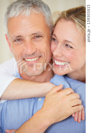 Happy couple, portrait and hug for love, support or care in romance together on holiday weekend at home. Face of mature married woman hugging man with smile in embrace, bonding or honeymoon at house Happy couple, portrait and hug for love, support or care in romance together on holiday weekend at home. Face of mature married woman hugging man with smile in embrace, bonding or honeymoon at house 139303815