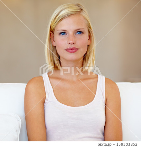Portrait, home and woman on a couch, relax and morning with weekend break, calm and peaceful in a lounge. Face, person and girl on a sofa, mindfulness and rest with wellness, health and mockup space 139303852