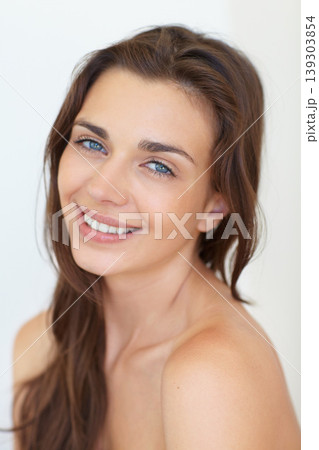 Portrait, beauty and aesthetic with a young woman in studio on a white background for natural skincare. Face, smile or cosmetics and a happy person looking confident with her antiaging skin routine Portrait, beauty and aesthetic with a young woman in studio on a white background for natural skincare. Face, smile or cosmetics and a happy person looking confident with her antiaging skin routine 139303854