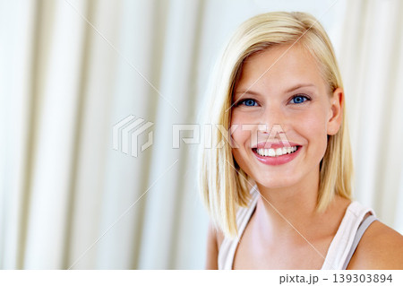 Relax, happy and portrait of woman in home for positive mindset, confidence and smile. Attractive, apartment and face of person in living room with happiness for free time, weekend and holiday 139303894