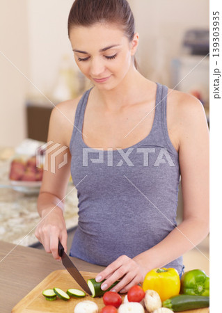 Woman, thinking and smile with knife or vegetables for nutrition, cooking or healthy meal in kitchen of home. Person, face and chopping board with mushroom, peppers and tomato for wellness and diet Woman, thinking and smile with knife or vegetables for nutrition, cooking or healthy meal in kitchen of home. Person, face and chopping board with mushroom, peppers and tomato for wellness and diet 139303935