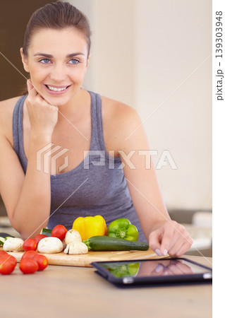 Woman, thinking and smile with tablet or vegetables for nutrition, cooking or healthy meal in kitchen of home. Person, face or chopping board with mushroom, peppers and tomato for wellness and recipe Woman, thinking and smile with tablet or vegetables for nutrition, cooking or healthy meal in kitchen of home. Person, face or chopping board with mushroom, peppers and tomato for wellness and recipe 139303948