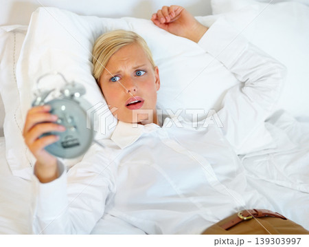Woman, business or late alarm clock, bedroom or home with urgent appointment, professional or career. Person, employee or worker with anxiety, stress or worried girl in panic with wake up time or bed Woman, business or late alarm clock, bedroom or home with urgent appointment, professional or career. Person, employee or worker with anxiety, stress or worried girl in panic with wake up time or bed 139303997