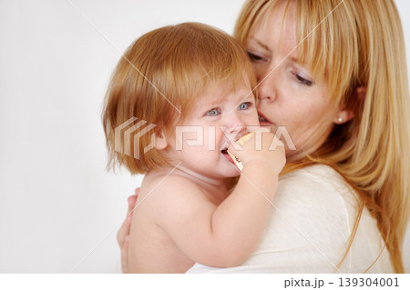 Woman, carrying and baby in home for love or safety care, childhood development and motherhood parenting. Female person, daughter and security support or play toy, together trust or bonding holding 139304001