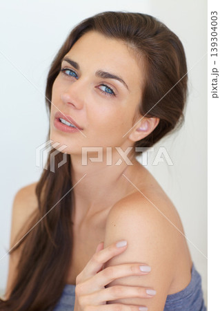 Portrait, beauty and cosmetics with a natural woman in studio on a white background for skincare or wellness. Face, manicure and hair with a confident young model at the salon for glow or shine Portrait, beauty and cosmetics with a natural woman in studio on a white background for skincare or wellness. Face, manicure and hair with a confident young model at the salon for glow or shine 139304003