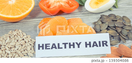 Nutritious food as source differents vitamins or minerals for healthy and lush hair 139304086