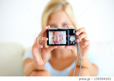Portrait, smile and woman with a digital camera, happiness and memory with break, excited or cheerful. Face, person or girl with equipment, photography or joyful with peace, screen or home with frame Portrait, smile and woman with a digital camera, happiness and memory with break, excited or cheerful. Face, person or girl with equipment, photography or joyful with peace, screen or home with frame 139304201
