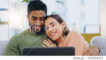 Couple, laptop and relax on sofa in home living room with smile, hug and watch movie together on web. Man, woman and happy with computer for streaming subscription, show or film with embrace on couch 139304222