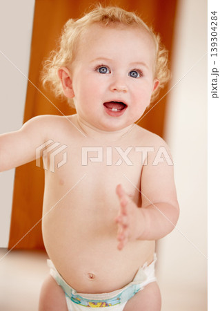 Happy, face and baby in a house for playing, watching or fun, learning, walk or balance. Little, child development and curious boy kid in a nursery playful, standing and enjoy youth, freedom or games 139304284