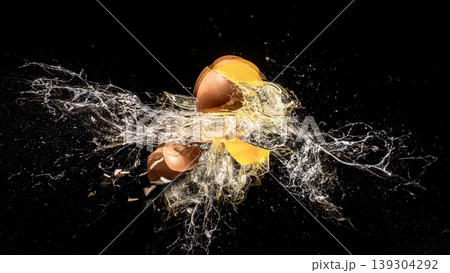 Egg shattering at high speed on black 139304292