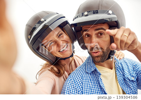 Couple, helmet and selfie on road trip or hands, adventure and vacation or holiday, romance and memories. Happy people, freedom and outdoors or travel, smile and love for social media on phone Couple, helmet and selfie on road trip or hands, adventure and vacation or holiday, romance and memories. Happy people, freedom and outdoors or travel, smile and love for social media on phone 139304586