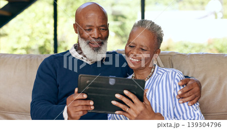 Tablet, video call and senior couple on a sofa for web communication, network or chat at home. Digital, app and old people in living room with love, social media or streaming subscription in a house Tablet, video call and senior couple on a sofa for web communication, network or chat at home. Digital, app and old people in living room with love, social media or streaming subscription in a house 139304796