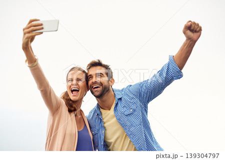Couple, selfie and freedom on vacation, smile and outdoors on adventure, love and memories for social media. Happy people, smartphone and bonding or technology, travel and holiday or pose on vacation Couple, selfie and freedom on vacation, smile and outdoors on adventure, love and memories for social media. Happy people, smartphone and bonding or technology, travel and holiday or pose on vacation 139304797