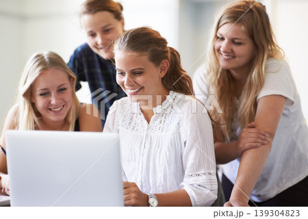 Group, project and students with laptop in class, research and learning with internet or website. Friends, reading and working on computer together in college, academy or studying online information Group, project and students with laptop in class, research and learning with internet or website. Friends, reading and working on computer together in college, academy or studying online information 139304823