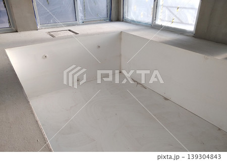 Interior of a house with big swimmig pool under renovation works. Interior of a house with big swimmig pool under renovation works. 139304843