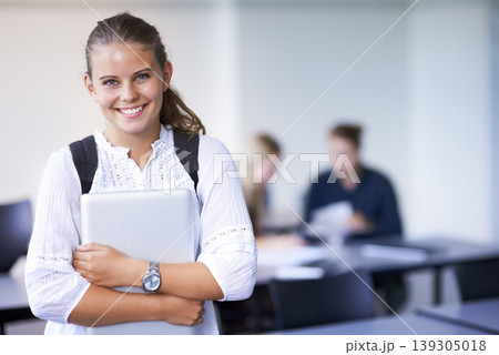 Girl, portrait and teenager with laptop in classroom, back to school and excited for learning. Academy, student and happy face with computer or tech for education, study and kid with a scholarship Girl, portrait and teenager with laptop in classroom, back to school and excited for learning. Academy, student and happy face with computer or tech for education, study and kid with a scholarship 139305018