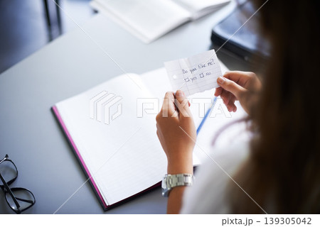 Secret, note and student with love letter in class at high school with girl and social communication. Hand, paper and teenager with checklist, information or romantic question in classroom from crush Secret, note and student with love letter in class at high school with girl and social communication. Hand, paper and teenager with checklist, information or romantic question in classroom from crush 139305042