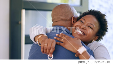 Couple, hug and key in new home or happy for real estate, property investment or celebration by front door. Black people, man and woman with embrace for fresh start, achievement and mortgage or smile Couple, hug and key in new home or happy for real estate, property investment or celebration by front door. Black people, man and woman with embrace for fresh start, achievement and mortgage or smile 139305046