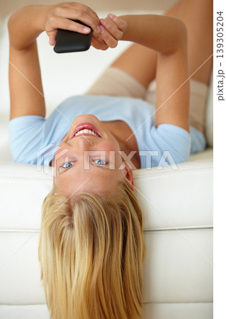 Portrait, smartphone or woman on a couch, smile or typing with internet, social media or relax. Person on a sofa, apartment or girl with a cellphone, website info or texting with digital app or home Portrait, smartphone or woman on a couch, smile or typing with internet, social media or relax. Person on a sofa, apartment or girl with a cellphone, website info or texting with digital app or home 139305204