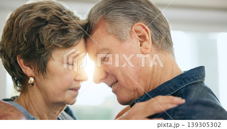 Senior couple, forehead and touch in house with love support, loyalty and security in retirement in family home. Mature man, woman or marriage gratitude for together, commitment or care in apartment Senior couple, forehead and touch in house with love support, loyalty and security in retirement in family home. Mature man, woman or marriage gratitude for together, commitment or care in apartment 139305302