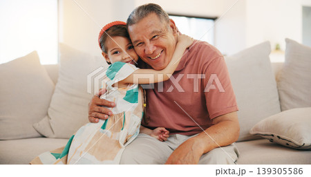 Home, portrait and hug with grandfather, girl and happiness with weekend break, relax and bonding together. Old man, senior person and child with joy, embrace and support with love, care and kid Home, portrait and hug with grandfather, girl and happiness with weekend break, relax and bonding together. Old man, senior person and child with joy, embrace and support with love, care and kid 139305586