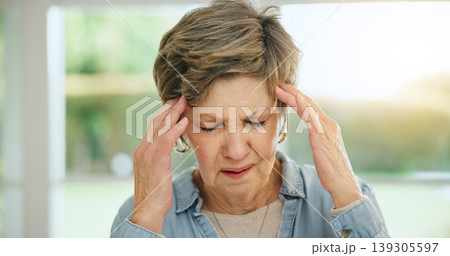 Stress, headache or old woman in home with burnout, worry or fatigue in retirement frustrated by debt. Exhausted person, anxiety or tired elderly lady with problem, crisis or head pain with migraine Stress, headache or old woman in home with burnout, worry or fatigue in retirement frustrated by debt. Exhausted person, anxiety or tired elderly lady with problem, crisis or head pain with migraine 139305597