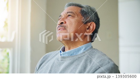 Thinking, nostalgia and senior man at a nursing home window with memory, moment or relax. Remember, face and elderly male person in a living room with reflection, calm or chilling in retirement 139305600