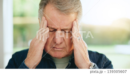 Stress, headache or old man in home with burnout, worry or fatigue in retirement frustrated by debt. Depression anxiety, face or tired elderly person with problem, crisis or head pain with migraine 139305607
