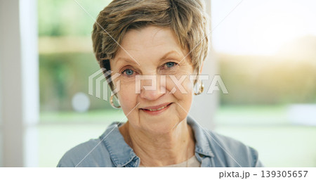 Senior woman, portrait and morning in retirement and home with happiness and health. Elderly, person and smile on face in house to relax with sunshine in apartment, living room or lounge on vacation Senior woman, portrait and morning in retirement and home with happiness and health. Elderly, person and smile on face in house to relax with sunshine in apartment, living room or lounge on vacation 139305657