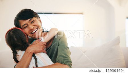Grandmother, grandchild and smile in hug, love and bonding in retirement, care and relaxing. Happy mexican people, sofa and welcome in visit, greeting and embrace on couch, gratitude and affection Grandmother, grandchild and smile in hug, love and bonding in retirement, care and relaxing. Happy mexican people, sofa and welcome in visit, greeting and embrace on couch, gratitude and affection 139305694