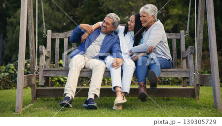 Senior parents, hug or woman on bench with laughing, nature or bonding with goofy on retirement. Mature man, mother or older daughter for together in comic joke, lounge or embrace for love in garden 139305729