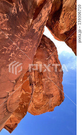 Abstract Red Sandstone Rock Formation Against Clear Blue Sky 139306710
