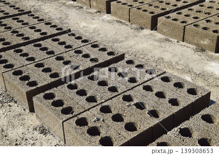 Cinder blocks lie on the ground and dried. on cinder block produ 139308653