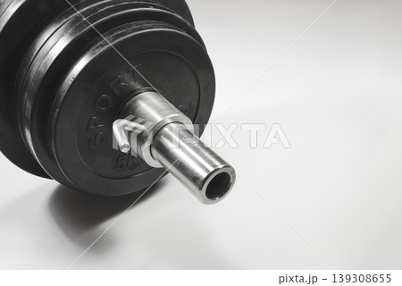 Grif rod with rubberized pancakes and lock on white background Grif rod with rubberized pancakes and lock on white background 139308655