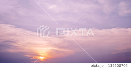 Sky and cloud background. Beautiful sky scenes with dramatic clouds and colorful sunrise and sunset light. Perfect for nature backgrounds weather concepts calm atmosphere and sunset skies background. 139308703
