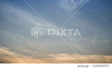 Sky and cloud background. Beautiful sky scenes with dramatic clouds and colorful sunrise and sunset light. Perfect for nature backgrounds weather concepts calm atmosphere and sunset skies background. 139308707