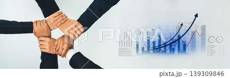 Diverse Hands Forming Unity Symbol Over Business Graphs Showing Growth and Success in Collaborative Teamwork and Partnership for Corporate Strategy Scalp Diverse Hands Forming Unity Symbol Over Business Graphs Showing Growth and Success in Collaborative Teamwork and Partnership for Corporate Strategy Scalp 139309846