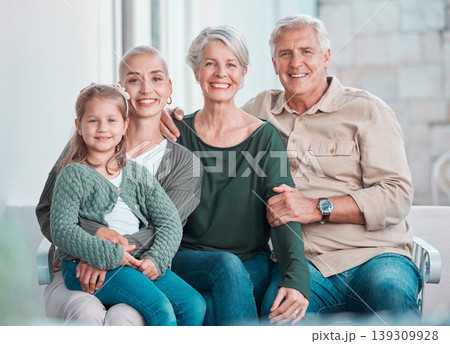 Grandparents, girl and mother in portrait on couch with hug, care or bonding with love in family home lounge. Elderly people, kid and mom with smile, relax and together on living room sofa in house Grandparents, girl and mother in portrait on couch with hug, care or bonding with love in family home lounge. Elderly people, kid and mom with smile, relax and together on living room sofa in house 139309928