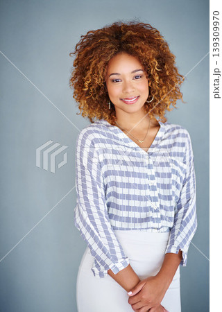 Portrait, happy and confident business woman isolated on a gray background mockup space. Smile, young professional and creative designer, female entrepreneur or employee working at startup in Brazil 139309970