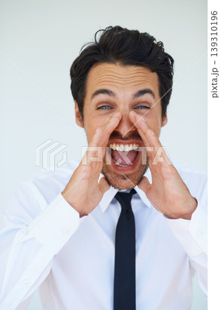 Portrait, hands and businessman shout for announcement, opinion or protest news in studio. Face of excited man scream for attention, notification or voice with sound, noise and white background. Portrait, hands and businessman shout for announcement, opinion or protest news in studio. Face of excited man scream for attention, notification or voice with sound, noise and white background. 139310196