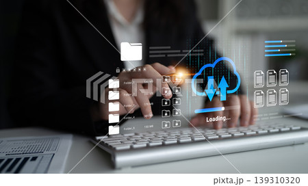Modern Businesswoman Working on a Digital Cloud File System with Data Analytics and Progress Indicators in a Professional Office Environment Ledger Modern Businesswoman Working on a Digital Cloud File System with Data Analytics and Progress Indicators in a Professional Office Environment Ledger 139310320