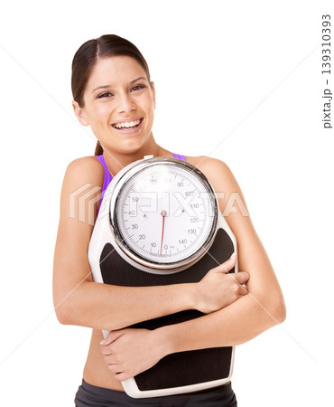 Scale hug, portrait and woman with weight loss goal, success and smile from health progress. Workout, fitness and sport training of a female person in studio with white background and wellness 139310393
