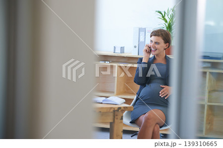 Businesswoman, pregnant and maternity phone call at office for break, childcare as waiting motherhood. Female person, stomach and book for due date as professional employee, career relax for infant 139310665