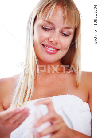 Woman, smile and lotion for skincare, bottle and white background or health, studio and wellness. Happy female person, cream and application or cosmetic product, dermatology and treatment or beauty Woman, smile and lotion for skincare, bottle and white background or health, studio and wellness. Happy female person, cream and application or cosmetic product, dermatology and treatment or beauty 139311204