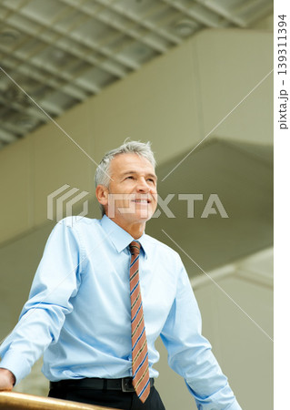 Businessman, thinking and confident or business company, corporate success or future growth. Male person, mature manager and thoughts for office balcony vision or professional, planning or mission Businessman, thinking and confident or business company, corporate success or future growth. Male person, mature manager and thoughts for office balcony vision or professional, planning or mission 139311394