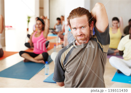 Portrait, stretching and relax, people in yoga class with man coaching, commitment and body wellness. Mindfulness, men and women in holistic club together with face, balance and fitness with pilates 139311430