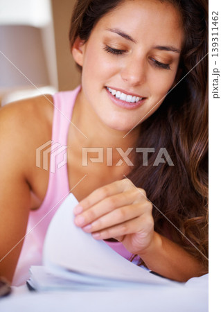 Young, woman and reading of book in bedroom for college, university or studying for test. Female, student and smile for learning, education and coursework with information, notes or paper for exam Young, woman and reading of book in bedroom for college, university or studying for test. Female, student and smile for learning, education and coursework with information, notes or paper for exam 139311462