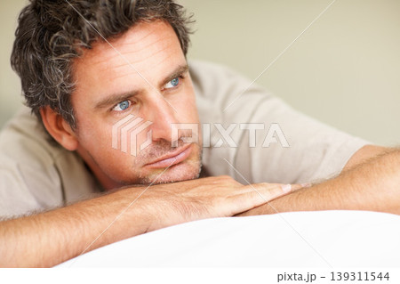 Thinking, relax and mature man in bed in the morning after nap, break or comfortable at home. Daydreaming, idea and male person from Canada wake up in bedroom for rest on cozy day in apartment. Thinking, relax and mature man in bed in the morning after nap, break or comfortable at home. Daydreaming, idea and male person from Canada wake up in bedroom for rest on cozy day in apartment. 139311544
