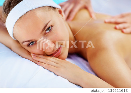 Spa, massage and woman portrait with beauty therapist hands for back care with wellness and health. Resort, masseuse table and calm female person with zen and pamper treatment for relax and relief 139311618